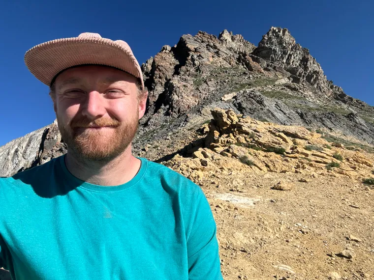 Andrew Gentry on a rocky ridge above treeline